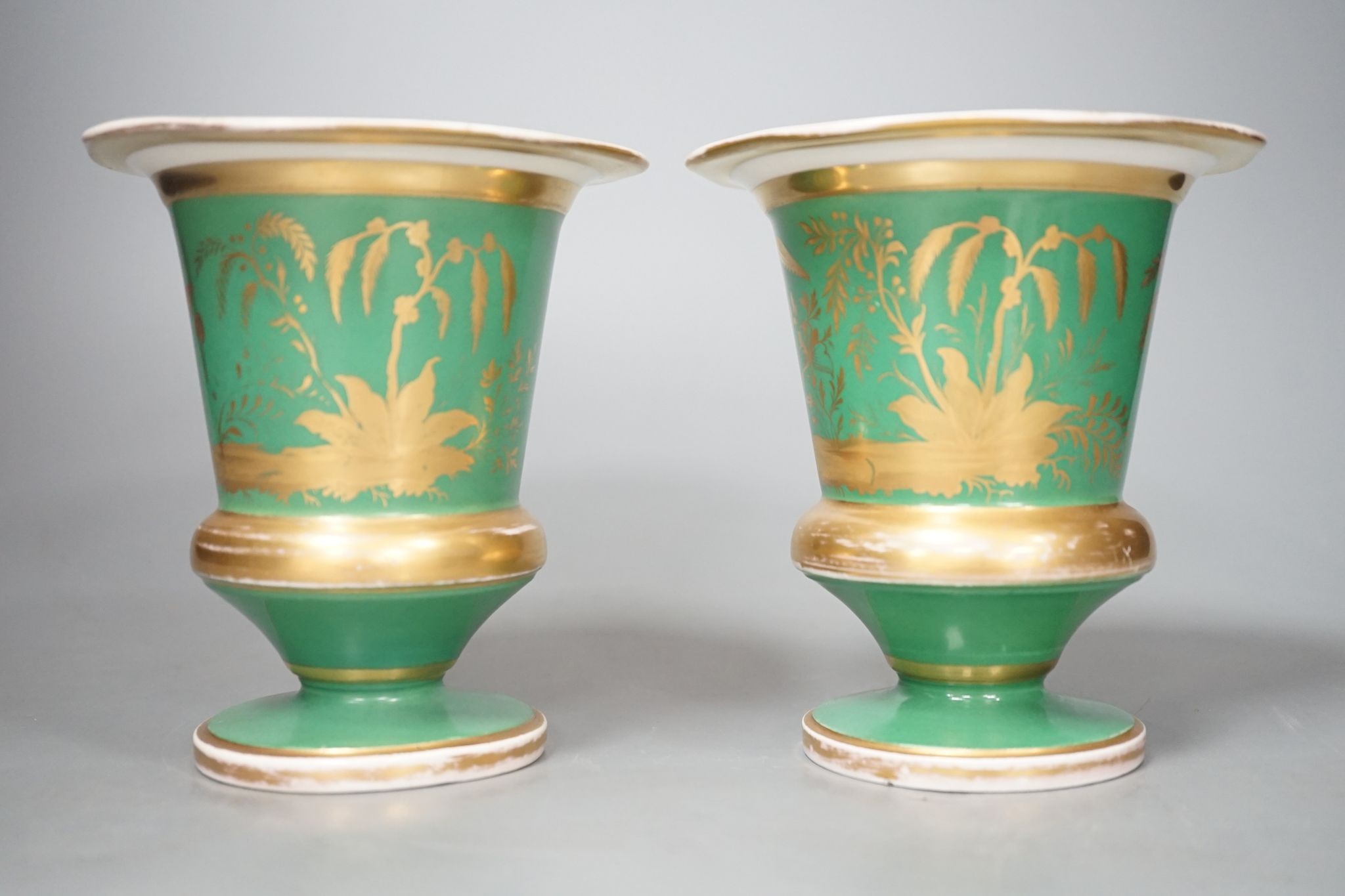 A pair of Continental porcelain spill vases 13cm